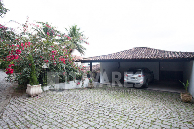 Casa em Barra da Tijuca, Rio de Janeiro/RJ de 604m² 5 quartos à venda por R$ 4.999.000,00